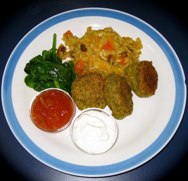 falafel and bombay rice with wilted spinach